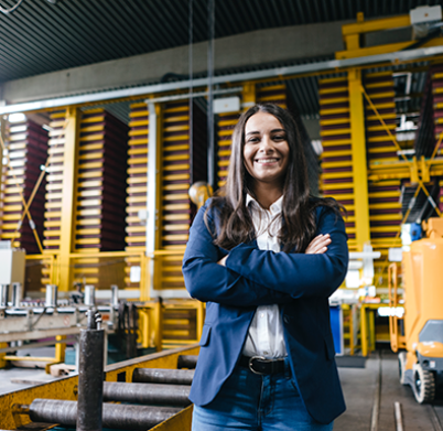 confident-woman-standing-in-logistics-center-with-2022-12-16-22-18-10-utc